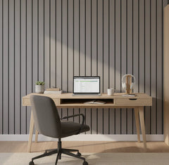 Wide slat 3-sided premium grey oak acoustic wall panels installed in a modern living room creating a stylish feature wall with improved sound quality solid furniture UK