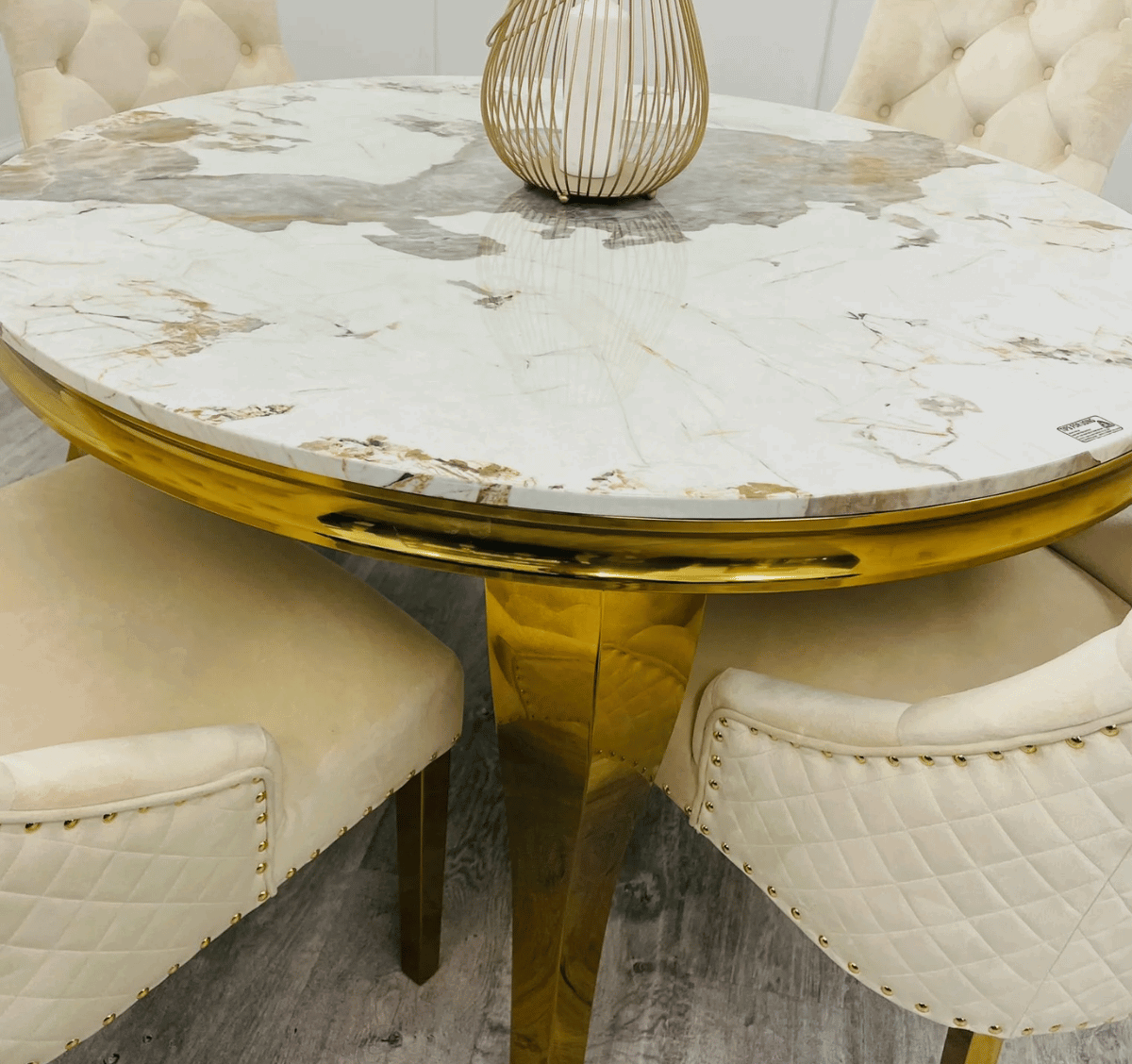 Louis Gold Round Pandora Marble Dining Table with Cream Velvet Chairs