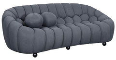 Stylish 3-seater grey sofa with boucle upholstery, perfect for lounging.