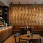 Installed acoustic self adhesive lattice wall panels pack of 4 from Solid Furniture UK used on a restaurant feature wall creating a modern, stylish interior with improved acoustic comfort and warm wood finish design