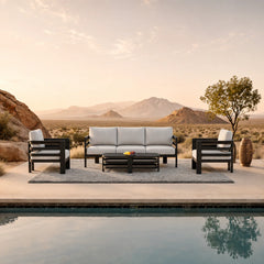Andros 5 seater outdoor garden lounge set styled in a UK garden at sunset from Solid Furniture UK