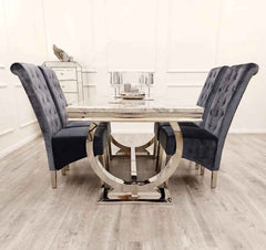 Ariana dining table and dark grey Sofia chairs side angle view showing chrome base modern dining set UK Solid Furniture UK