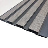 Close-up of Solid Furniture uk ash grey WPC slatted wall panels with a natural wood-effect finish