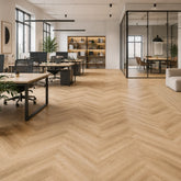 Aurevia Blond Oak LVT Flooring installed in a modern office by Solid Furniture UK
