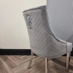 Back side view of Bentley velvet dining chair Solid Furniture UK showing lion knocker and chrome detailing
