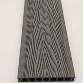 Premium black 290cm composite decking boards creating a stylish outdoor garden space by Solid Furniture UK