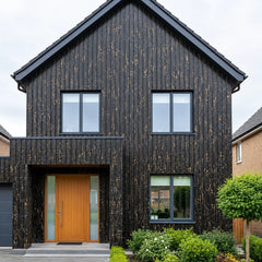 Black and gold marble effect WPC wall panels 15x240cm fitted to two-storey house exterior – Solid Furniture UK