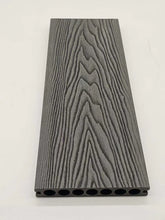 Close-up view of pack of 4 black outdoor decking boards 290cm from Solid Furniture LTD UK, showing detailed texture, grooved design, and durable finish for outdoor use