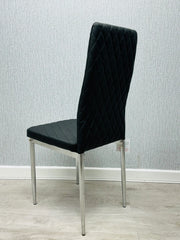 Back view of black California PU Dining Chair showing modern structure and sturdy chrome legs by Solid Furniture UK