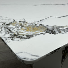 Angled view of Capri grey and white marble effect dining table highlighting modern design, marble effect surface and contemporary style solid furniture UK