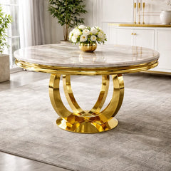 Chelsea 1.3m round dining table with marble top and polished gold base in a dining room – Solid Furniture UK