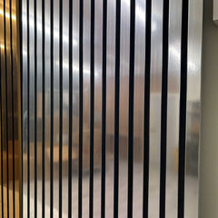 Close-up of 60x240cm Chrome Metallic Acoustic Wall Panel by Solid Furniture LTD showing reflective surface and slat detail