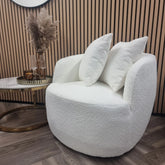 Front view of Cuddle Accent Chair in soft bouclé fabric, showcasing compact modern design for living rooms and bedrooms. solid furniture UK