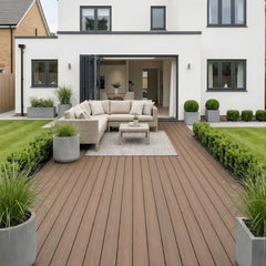 Dark brown 290cm composite decking installed at the front of a house by Solid Furniture UK