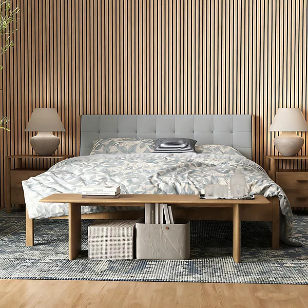 Bedroom interior in the UK featuring dark oak HDF acoustic slatted wall panels 60x240cm by Solid Furniture UK, adding warmth and improved sound control.