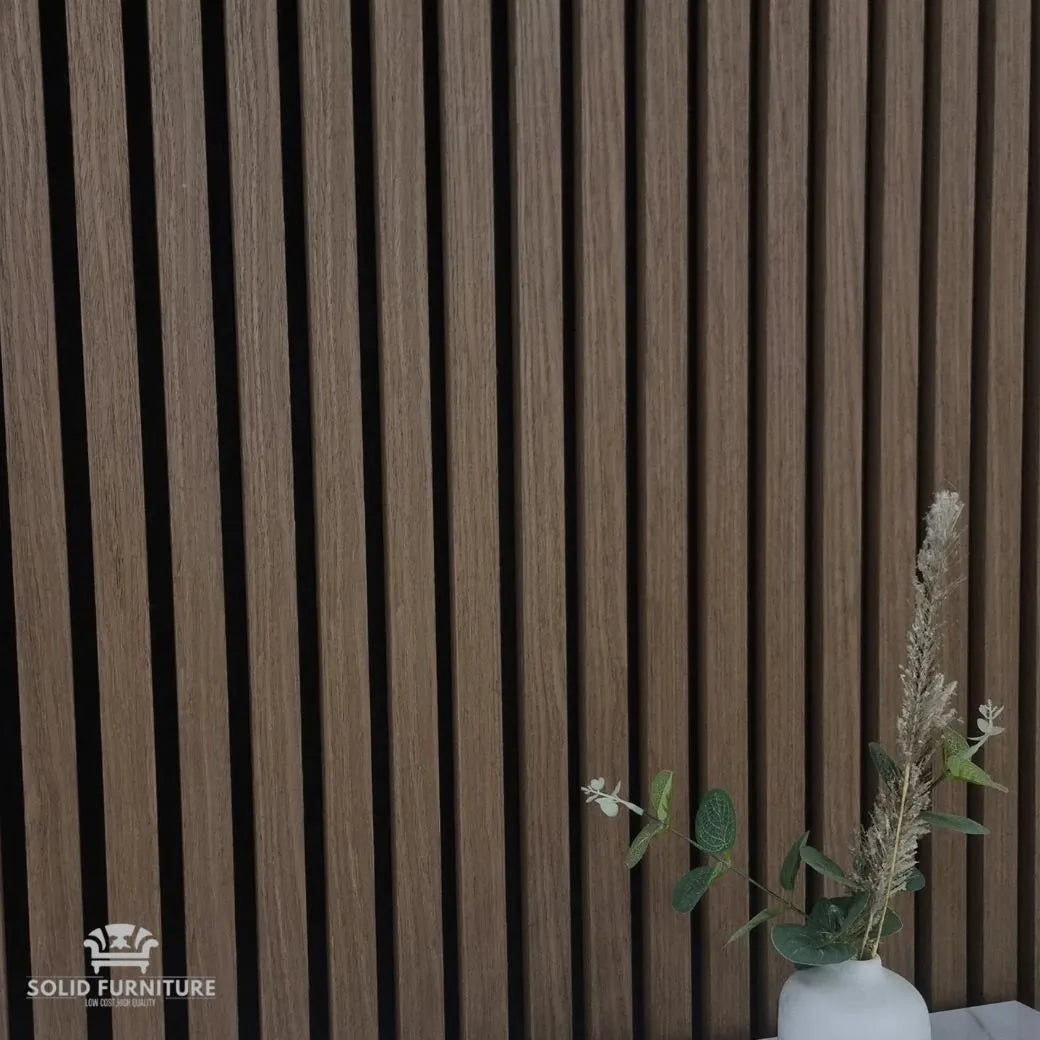 Dark Oak 60x240cm wall panels by Solid Furniture UK installed on interior wall creating a modern acoustic feature wall in a residential space