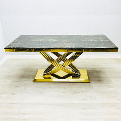 Elina gold marble dining table in black and gold finish shown in main front view with rectangular design and modern luxury style. solid furniture UK