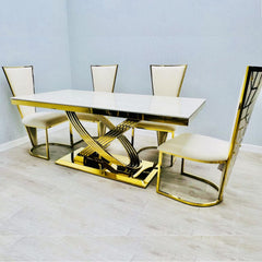 Side view of Elina white and gold dining table with chairs showing seating arrangement and refined contemporary design. solid furniture UK