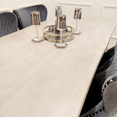 Side view of Freya 1.8m dining table UK from Solid Furniture UK with chairs showing seating layout, table height, and chrome metal legs