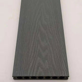Grey 290cm composite decking boards installed in a modern outdoor space by Solid Furniture UK