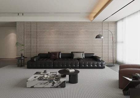 Grey seamless WPC wall panels with wood-effect finish installed on a modern interior wall Solid Furniture UK