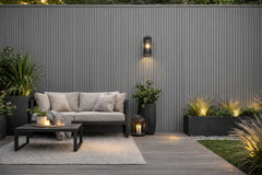 Grey WPC outdoor wall panels 180cm and 290cm installed on exterior wall in the UK by Solid Furniture LTD, ideal for gardens, patios, balconies, and feature walls