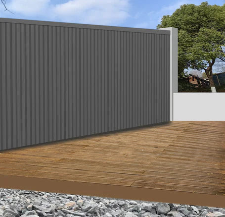 Grey WPC outdoor wall panels 180cm and 290cm installed in a modern UK garden setting by Solid Furniture LTD, showcasing sleek and durable exterior wall design