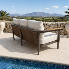 Hemera Wood outdoor garden lounge 3-seater sofa side angle view, modern wood-effect aluminium frame with deep cushions for stylish patio seating solid furniture UK