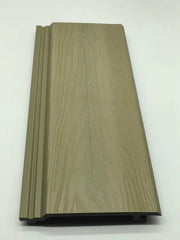 Interlocking khaki composite exterior wall panels on a modern building Soli Furniture UK