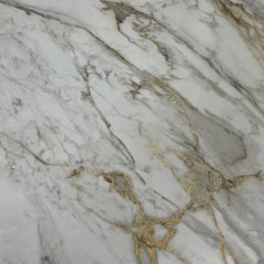 Jessica coffee table showing Kata Gold ceramic tabletop finish in close-up view, Solid Furniture UK
