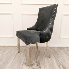 Side view of Kensington dark grey fabric dining chair showing chrome legs and elegant stud detailing UK