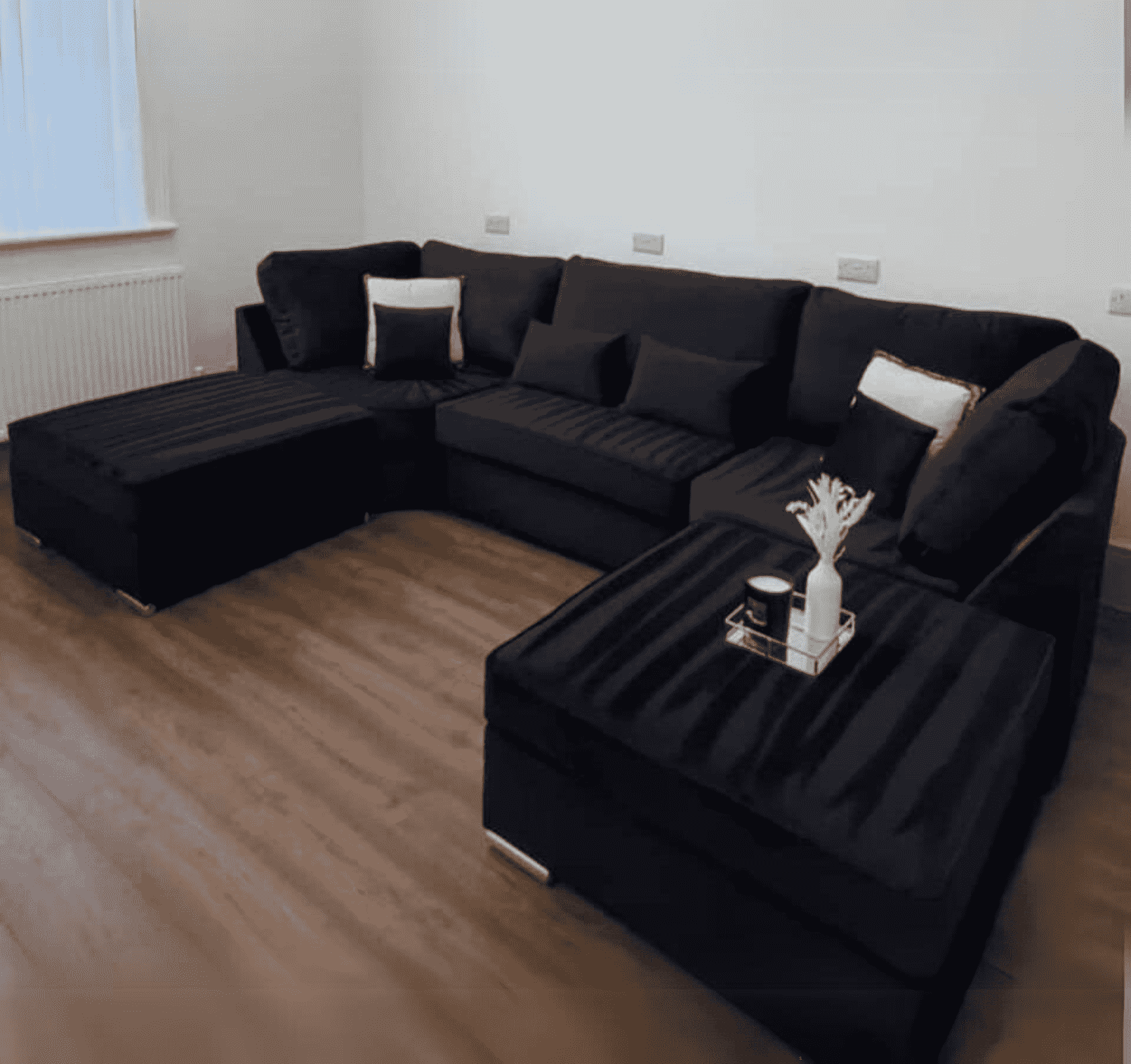 Large Bishop U shape corner sofa in black chenille fabric showing spacious UK made design and deep seating SOLID FURNITURE LTD