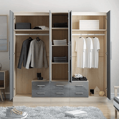 Large grey gloss bedroom wardrobe with mirrored doors and spacious storage design