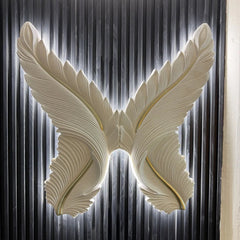 LED Wings Decorative Wall Art illuminated with soft ambient lighting by Solid Furniture UK, creating an elegant focal point for modern interiors.