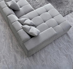 Leonard modular corner sofa with five scatter cushions in cloudy grey bouclé - SOLID FURNITURE LTD