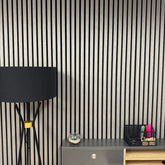 Light grey HDF acoustic slatted wall panels 60x240cm in a modern interior in the UK by Solid Furniture UK, combining sound absorption with stylish design.