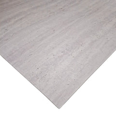 Side view of Light Grey MCM Travertine Stone Wall Tiles 120 x 60cm pack of 4 by Solid Furniture LTD showing tile thickness and flexible design