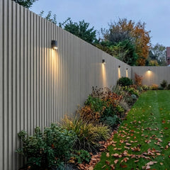 Light grey seamless waterproof WPC wall panels 15×240cm pack of 16 installed in a garden by Solid Furniture UK