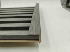 Installed light grey WPC end trim UK by Solid Furniture LTD providing a neat and professional edge finish for wall panels in interior space