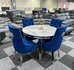 Full view of elegant dining set by Solid Furniture UK featuring 1.3m round marble table with navy velvet chairs