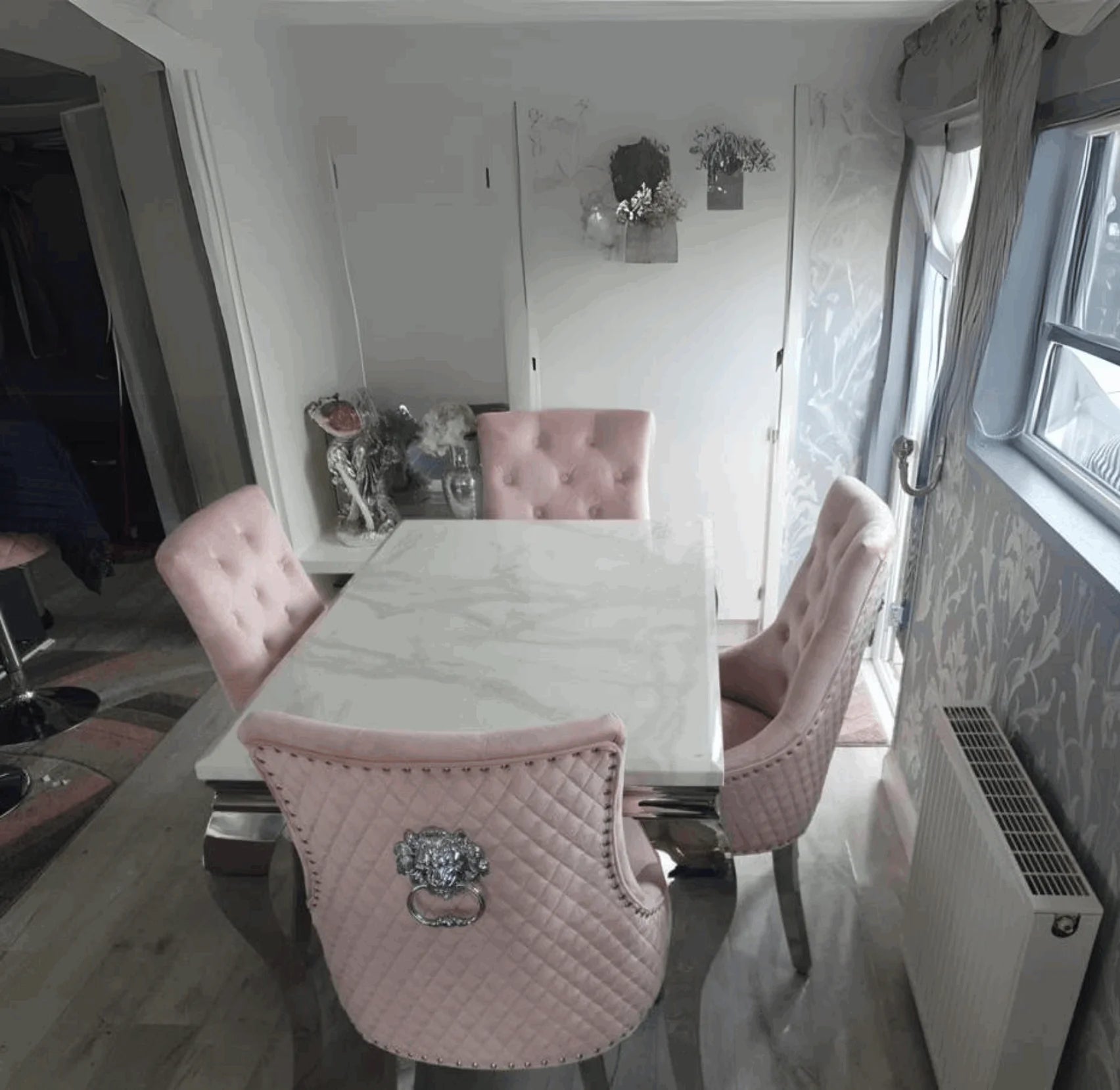 Louis white marble dining table with pink Majestic velvet dining chairs from Solid Furniture UK – main view