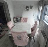 Louis white marble dining table with pink Majestic velvet dining chairs from Solid Furniture UK – main view