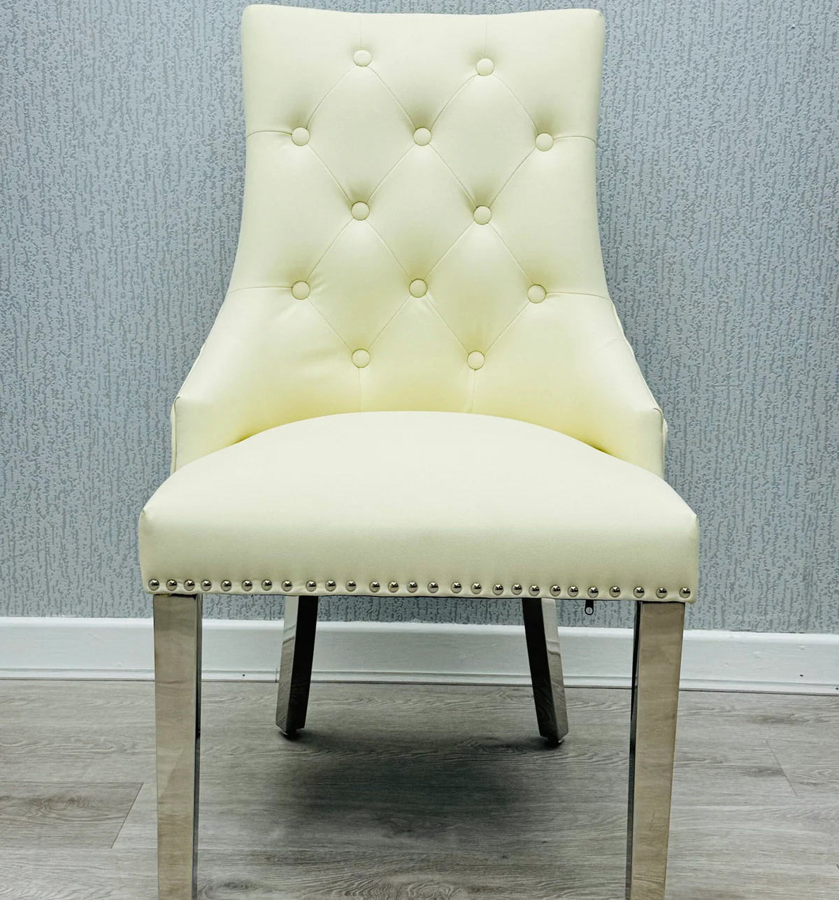 Majestic Cream PU Leather Dining Chair with Lion Knocker Detail Main View from Solid Furniture UK