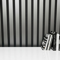 Close-up of metallic dark grey slatted wall panel, highlighting the slim slat design, 2.5 cm width, 1.5 cm spacing, and textured HDF finish. solid furniture UK