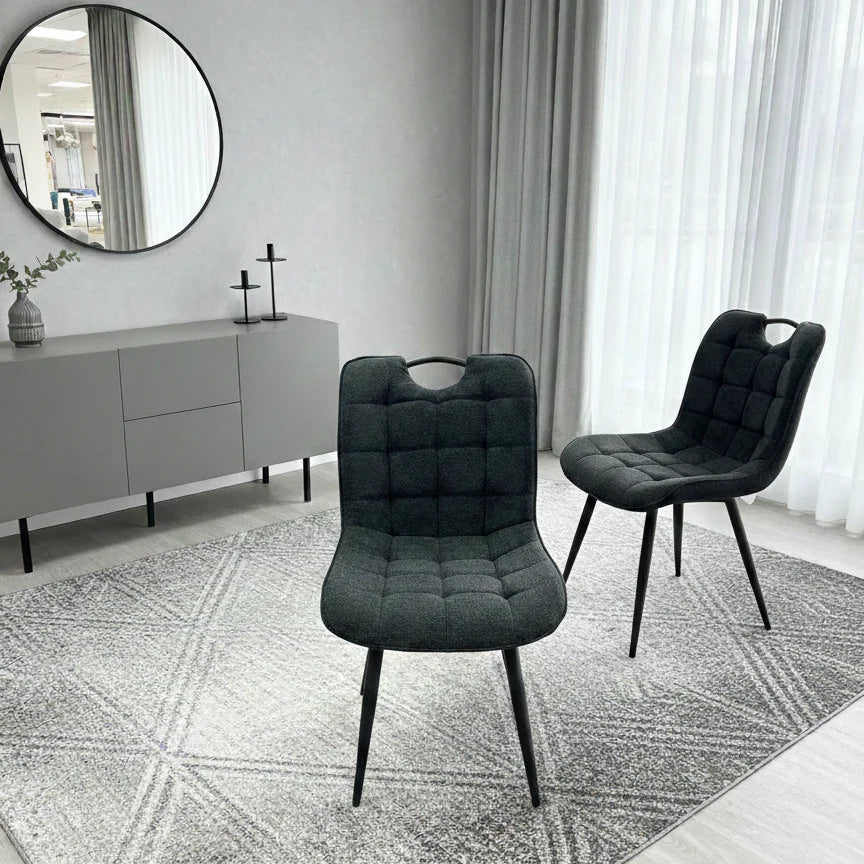 Black Monza fabric dining chair main front view with modern upholstered design from Solid Furniture UK