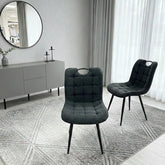 Black Monza fabric dining chair main front view with modern upholstered design from Solid Furniture UK