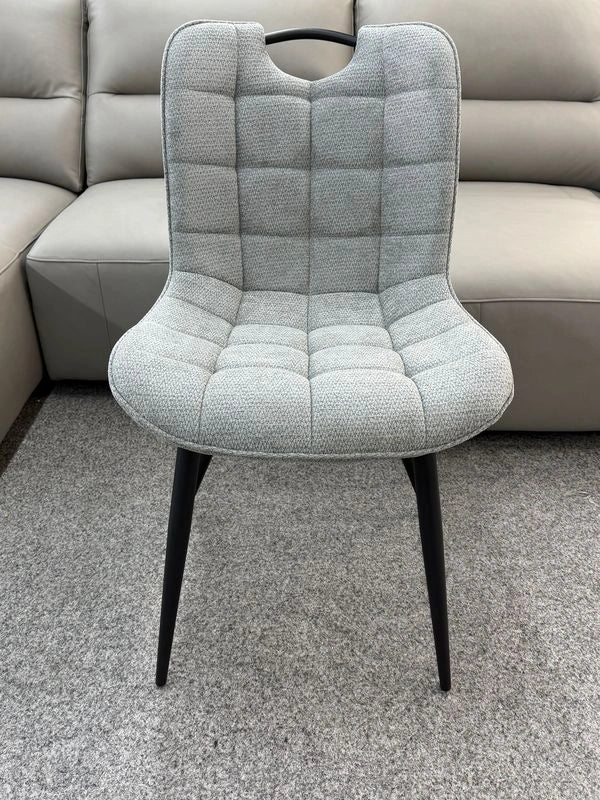 Grey Monza fabric dining chair main front view with modern upholstered design from Solid Furniture UK