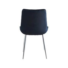 Back view of Mortiz black velvet dining chair with curved backrest and chrome frame from Solid Furniture UK