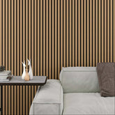 Drawing room in the UK featuring natural oak acoustic slatted wall panels 60x240cm by Solid Furniture UK, adding warmth and improving sound quality.