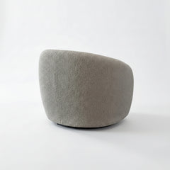 Nolita boucle accent chair back view with curved upholstered design | Solid Furniture UK